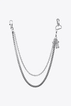 Silver cross waist chain with layered belt and charm details