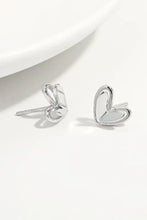 Sterling silver heart stud earrings in silver-toned heart shape