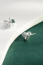 Two sterling silver heart stud earrings in heart shape