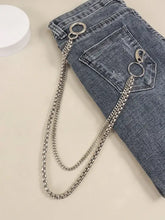 Denim jeans with silver metal chain belt and O-ring details