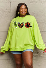 Lime green oversized drop shoulder graphic sweatshirt with Halloween patches
