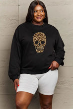 Black full size drop shoulder graphic sweatshirt with leopard skull print