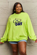 Plus-size woman in lime green drop shoulder long-sleeved Game Day sweatshirt