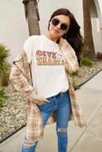 Woman in Simply Love short sleeve basic style t-shirt with plaid shirt and jeans