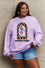 Plus-size woman in light purple Happy Halloween graphic sweatshirt and denim shorts