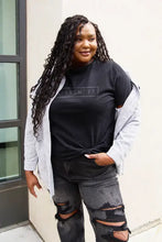 Woman in Simply Love full size killinit short sleeve t-shirt with striped shirt and ripped jeans