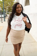 Womans white short-sleeved Simply Love letter graphic t-shirt with beige mini skirt