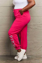 Simply Love full size pink graphic sweatpants in hot pink with white PINK lettering