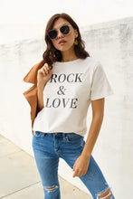 Woman in Simply Love full size Rock & Love short sleeve t-shirt, basic style