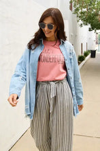 Pink wonderfully short sleeve t-shirt with black text graphic