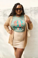 Beige cable knit cardigan with pockets over Simply Love Mama Round Neck T-Shirt