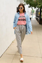 Woman in Simply Love Mom Mode Short Sleeve Graphic T-Shirt