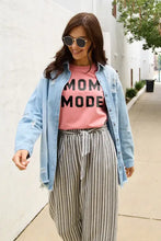 Woman in Simply Love Mom Mode short sleeve graphic t-shirt