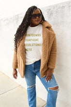 Simply Love cream t-shirt, brown teddy coat with sleeve length, and distressed blue jeans outfit for women