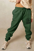 Simply Love womens dark green jogger sweatpants with graphic design and elastic waistband