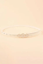 Skinny PU belt with flower decor and starburst headband accents