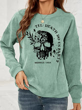 Mint green long-sleeved corduroy skull graphic dropped shoulder sweatshirt