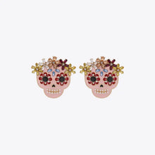 Pink skull rhinestone alloy earrings with colorful gemstones and floral details