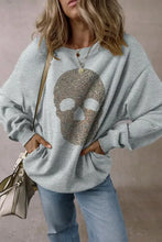 Gray skull round neck long sleeve sweatshirt with brown graphic