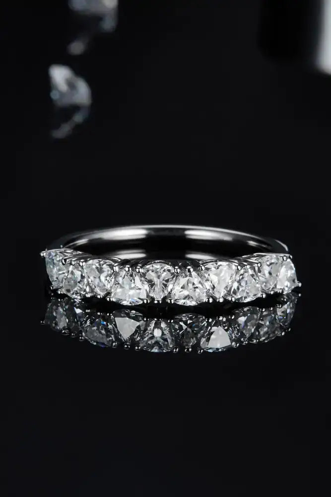 Sleek 1 carat moissanite sterling silver ring with heart-shaped stones
