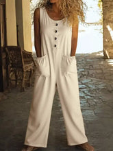 Cream-colored sleeveless button front wide leg jumpsuit with pockets
