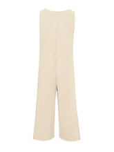 Cream-colored sleeveless button front wide leg jumpsuit