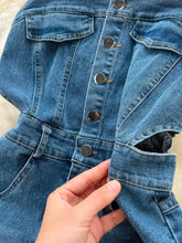 Blue denim sleeveless frayed hem denim dress with silver buttons and front button closure featuring a slit