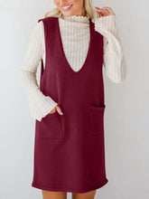 Sleeveless maroon knit dress with V-neckline and front pockets