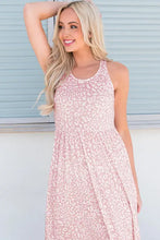 Sleeveless maxi dress in blush pink floral print with smocked waistband