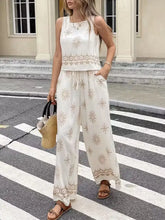 Sleeveless top and wide-leg pants set with beige floral embroidery and lace trim