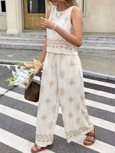 Sleeveless top and wide-leg pants set with beige floral embroidery