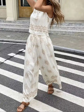 White embroidered Sleeveless Top and Wide Leg Pants Set with gold floral patterns
