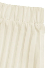 Cream-colored pleated maxi skirt with elastic waistband from Sleeveless Vest Set