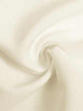Cream-colored sleeveless vest and pleated maxi skirt set fabric detail