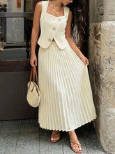 Cream-colored pleated midi skirt in Sleeveless Vest and Pleated Maxi Skirt Set