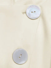Glossy white button with iridescent sheen for Sleeveless Vest and Pleated Maxi Skirt Set