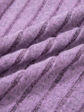 A slim ribbed mineral wash tank top in soft lavender ribbed knit fabric with subtle darker purple vertical stripes