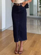 Dark blue denim skirt with high waist front zipper and slit front denim skirt features suitable for tumble dry care