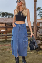 Blue denim midi denim skirt with multiple pockets and a front slit for stylish casual wear