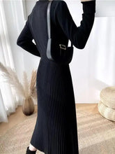 Black ribbed knit midi dress with slit front mock neck and long sleeves