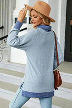 Light blue slit mock neck long sleeve t-shirt with cowl neck and hem
