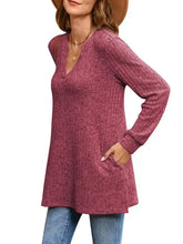 Deep maroon pocketed long sleeve tunic with V-neck and side slits