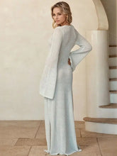 Woman in slit plunge flare sleeve cover-up dress