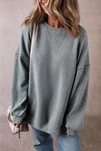 Oversized heathered teal slit round neck long sleeve sweatshirt