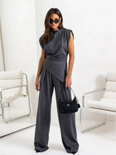 Black Prada handbag with triangular gold logo on Slit Ruched Top set
