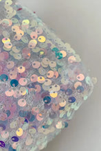 Iridescent sequin shoulder bag in polyester on white background