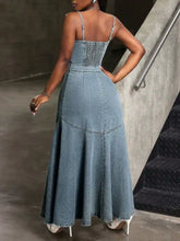 Smocked button front denim cami dress with thin straps and a flared skirt in blue denim fabric