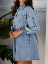 Light blue denim dress with smocked cuffs ruffled flared sleeves and front pocket in denim shirt mini style
