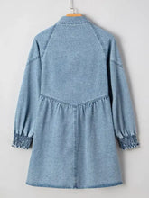 Light blue denim dress with long sleeves and smocked cuffs featuring a flared denim shirt mini dress design
