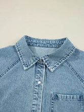 Light-wash denim shirt with classic collar chest pocket and smocked cuffs for a flared denim dress mini style
